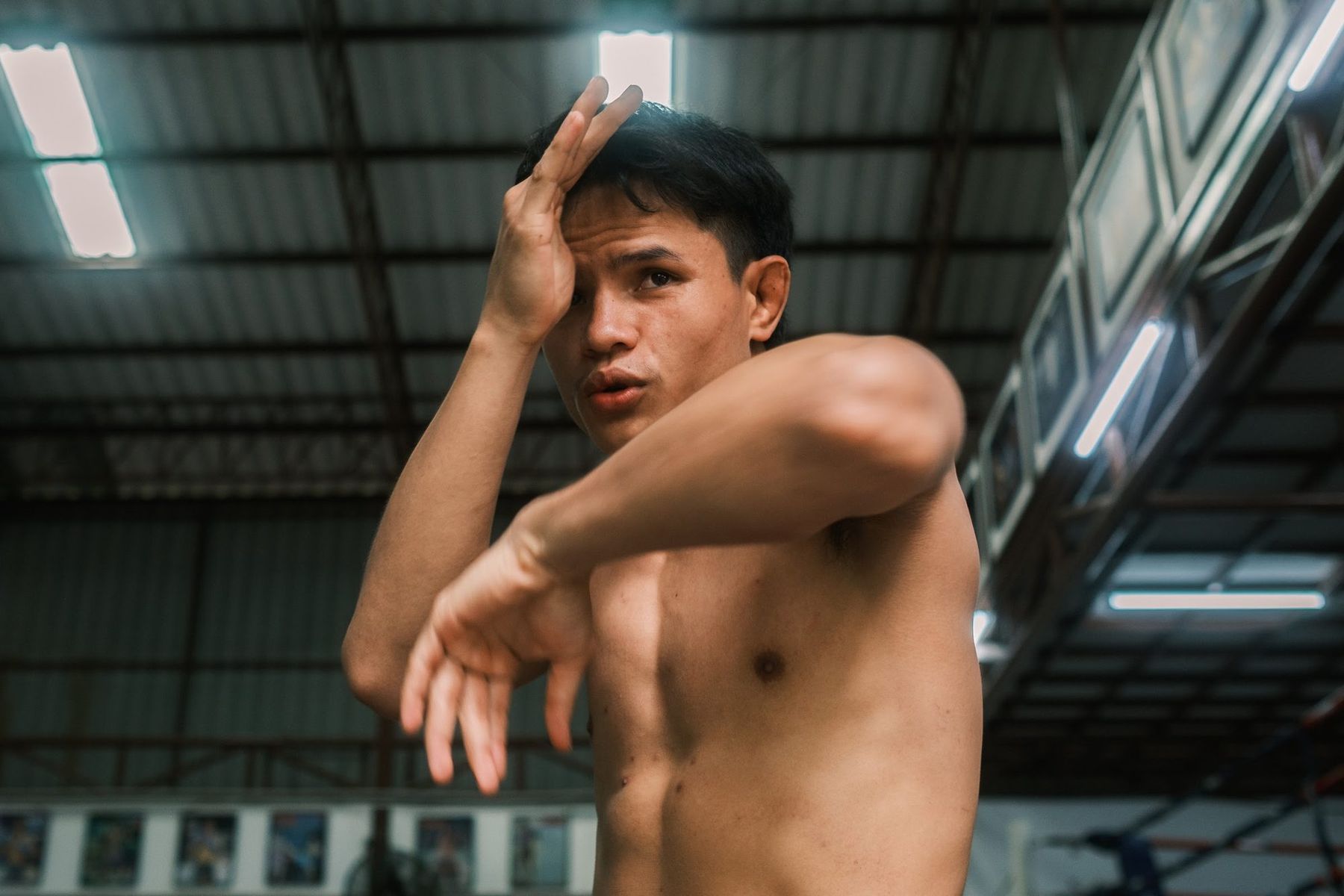 BEFORE THE BELL: young Muay Thai fighter in the gym