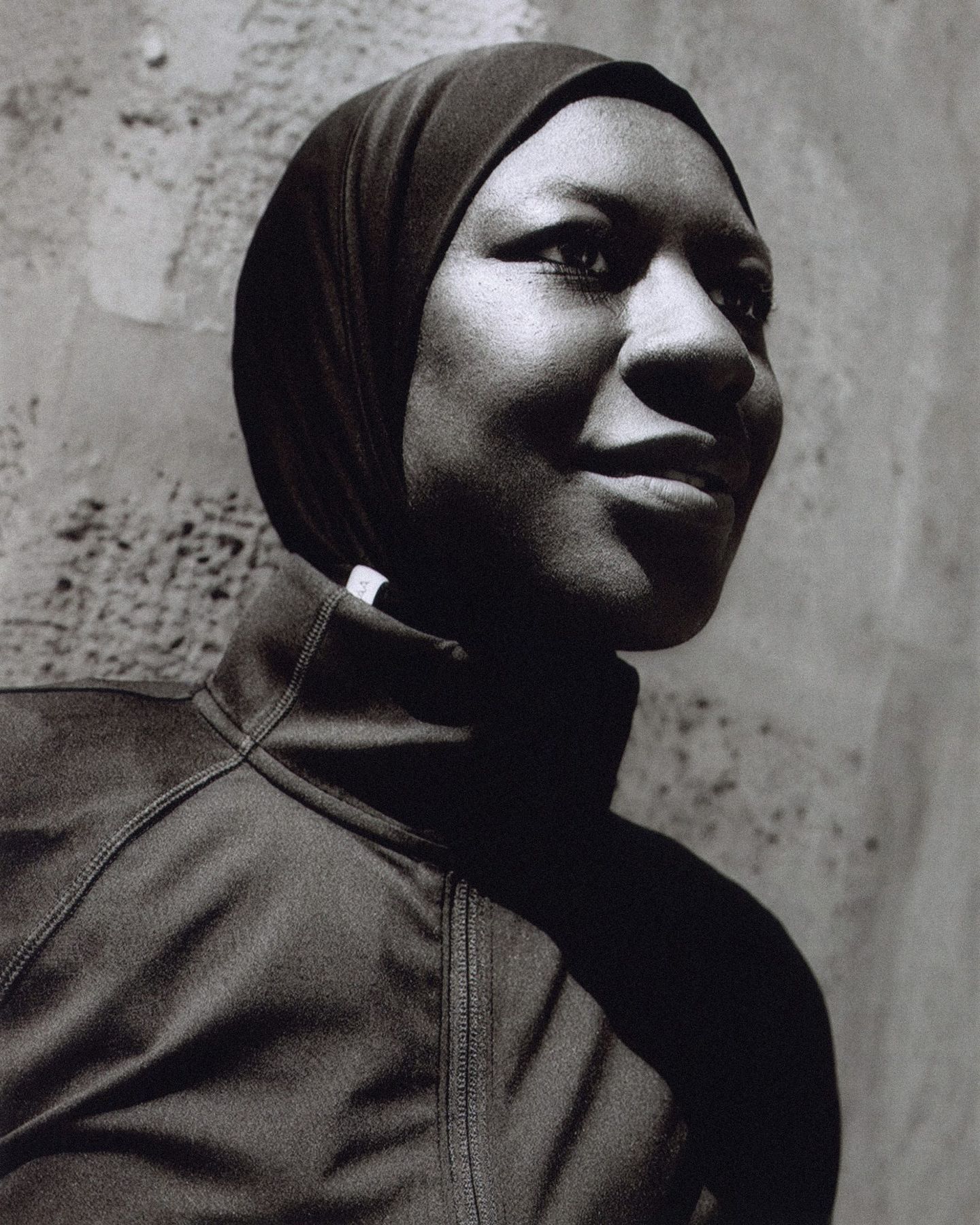 OPEN PLAY: runner in hijab smiling
